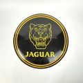 Plaque émaillée circulaire Jaguar jaune sur fond vert, 50 cm, bel état