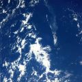 NASA. Observation of the Earth. Volcano in eruption and its plume of smoke