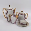 Service à thé Limoges ULM en porcelaine polychrome et doré, décor géométrique