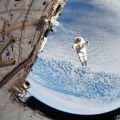Historical photograph of Space Shuttle Discovery and the SAFER system