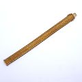 Bracelet in 18-carat gold, braided link, slightly curved, weight 48g