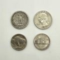 Four U.S. coins: Buffalo, Washington, and Jefferson, various years