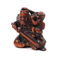 Netsuke Edo en buis : Shoki et l'oni, signé Koremune, XIXe siècle