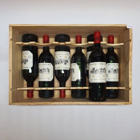 Sept bouteilles de Château d'Angludet 1992 en caisse en bois, Cru bourgeois