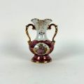 Petit vase à anses Limoges années 50, décor galant et dorures raffinées