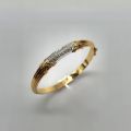 Bracelet jonc en or 18ct avec diamants, décoré de noeuds et filets