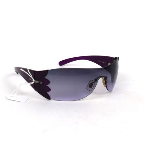 Lunettes de soleil Miu Miu couleur violet forme masque lunettes