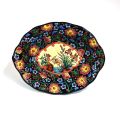 Coupe ovale en Emaux de Longwy : décor floral et échassier, 22,5 x 28,5 cm