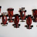 Ensemble de 10 voitures réduites de Fomule 1 en métal 1/43 FERRARI