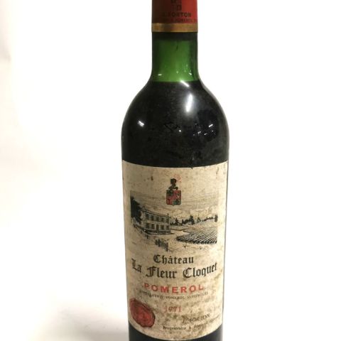 Bouteille de Château à Fleur Cloquet, Millésime 1971, étiquette poussiéreuse, niveau épaule