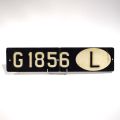 Plaque d'immatriculation luxembourgeoise avec logo "L", signée J. GRUN, 12 x 53 cm