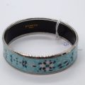 Bracelet jonc émaillé Hermès, couleurs vives, avec sac d’origine