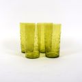 Suite de 4 verres en cristal vert, fin XIXe - début XXe siècle