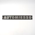 Painted metal "Automiesse" monogram for buses and trucks from the 60s and 70s