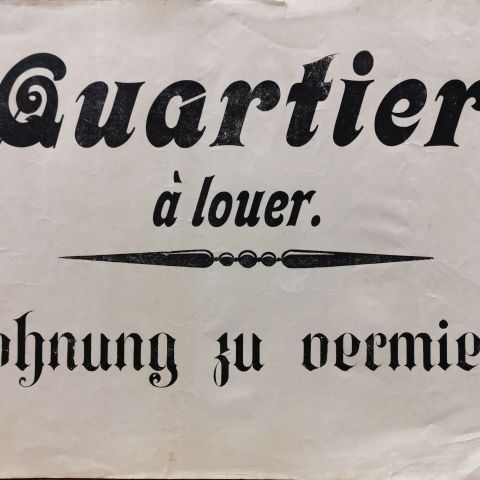 Affichette de location ancienne : "Quartier à louer. Wohnung zu vermieten" (fin XIXe, début XXe)